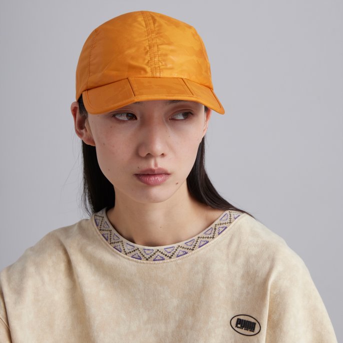 Puma På Tilbud X Fordeler Og Mini Sammenleggbar Hette Oransje Murstein